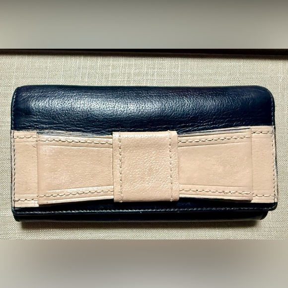 kate spade Handbags - Kate Spade Black and Cream Bow Wallet